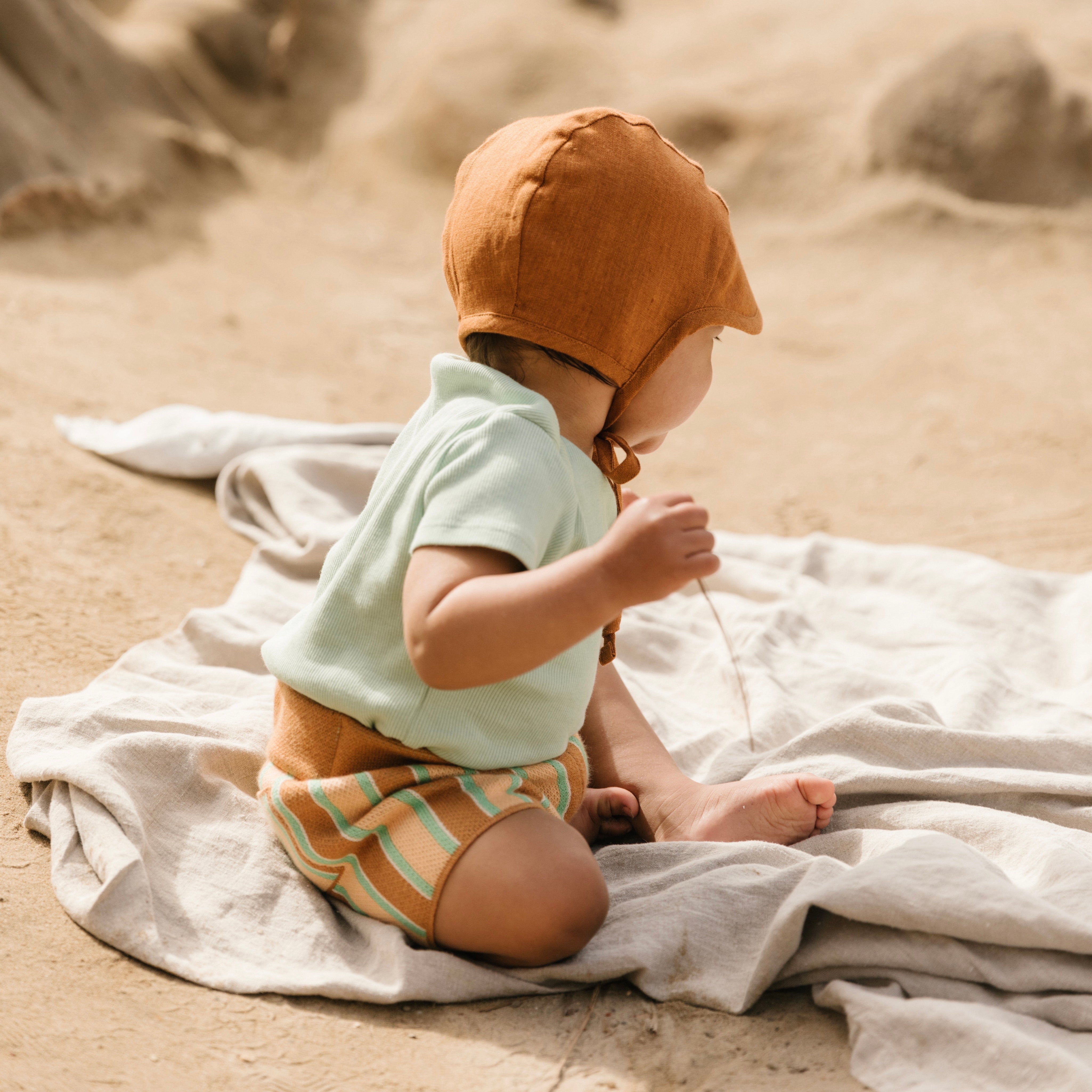 BRIMMED BONNET | RUST LINEN